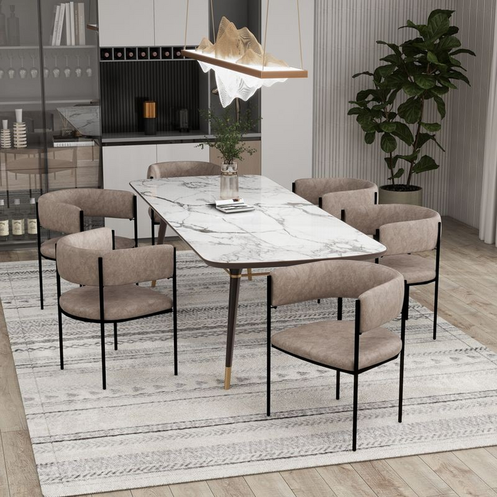 LeisureMod Cyril Collection Modern Chair in Aged Grey at Table.