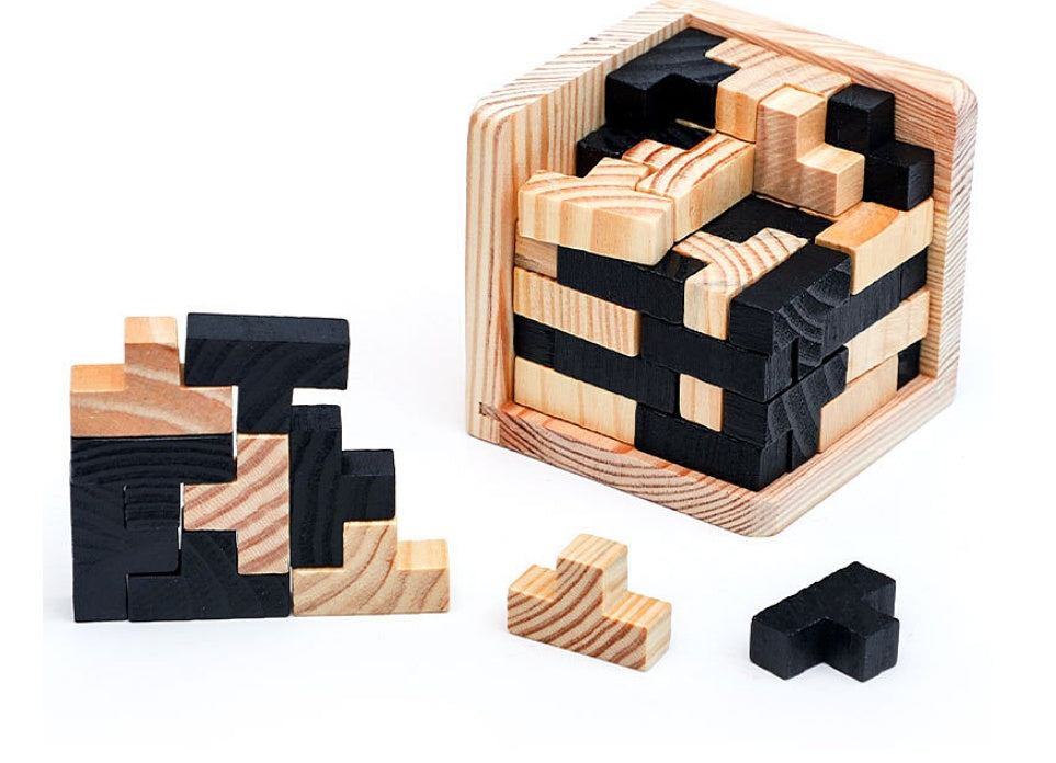 Wooden puzzle with black and natural wood pieces on a white background.