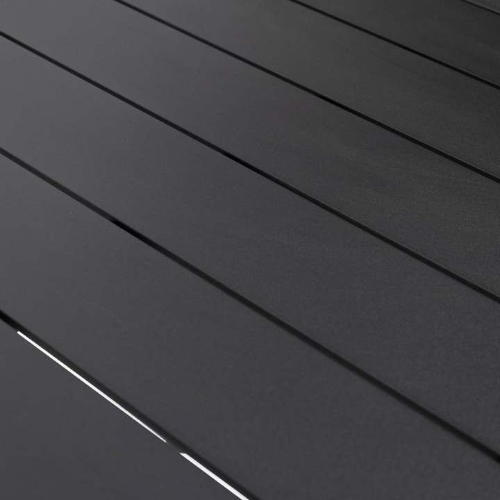 Leisuremod Chelsea Aluminum Outdoor 63" Dining Table in Black Material Closeup.