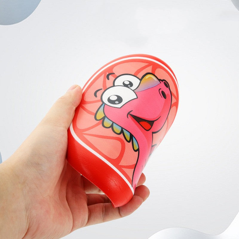 Hand holding a red heart-shaped container with a cartoon character on a light gray background.