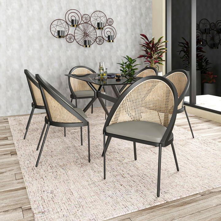 LeisureMod Urbane Collection Modern Dining Chair with Wicker Back in Olive Green at Table.
