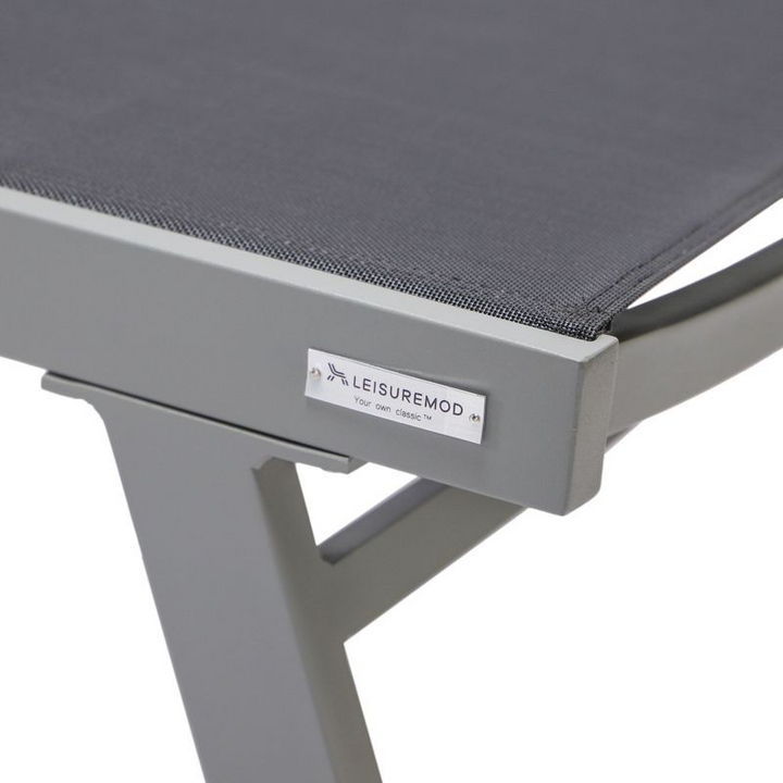 LeisureMod Marlin Patio Chaise Lounge Chair with Armrests in Grey Aluminum Frame, Set of 2 in Black Closeup.