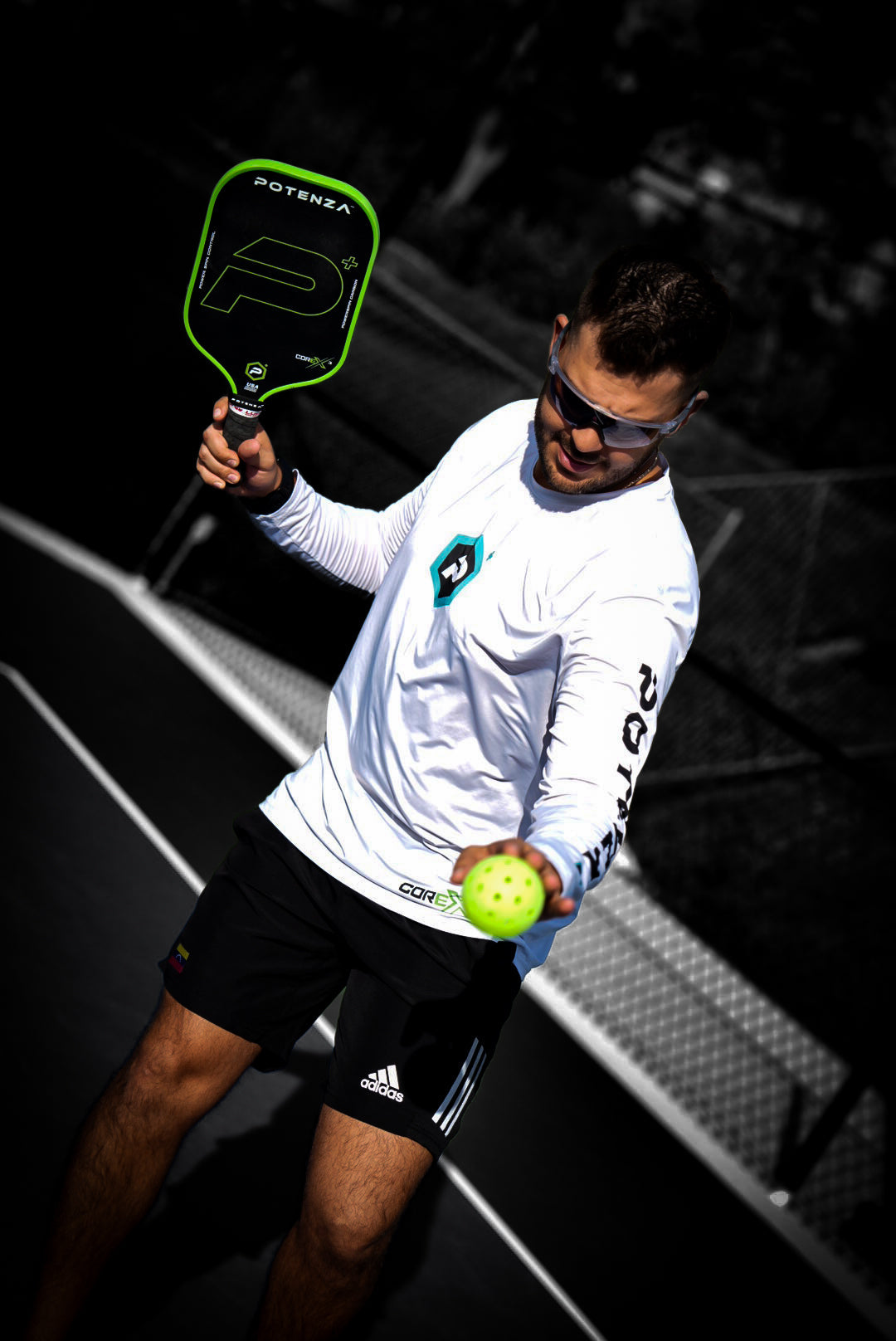 P+ PowerSpin Carbon COREx3 Pickleball Paddle (Neon Green) with Model.