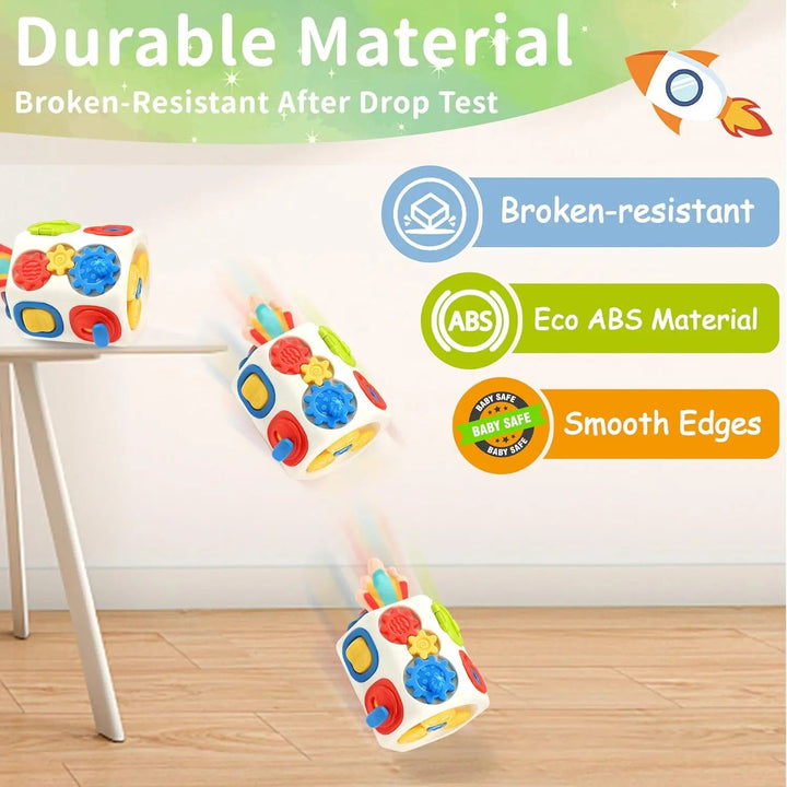 Colorful toy cube with text about durability and material safety on a wooden floor.