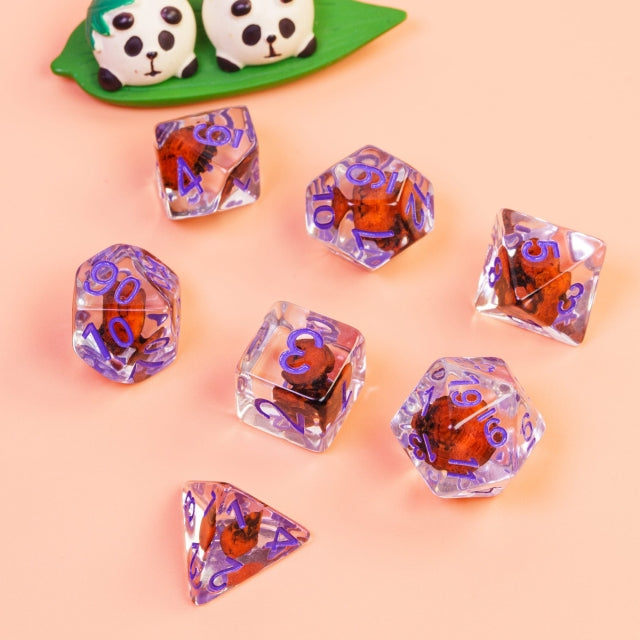 Orange Skull Dice | Clear RPG 7-Dice Set w/ Purple Numbers