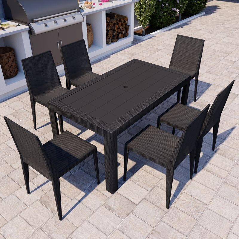 LeisureMod Weave Mace Indoor/Outdoor Dining Chair (Armless) Black at Table.