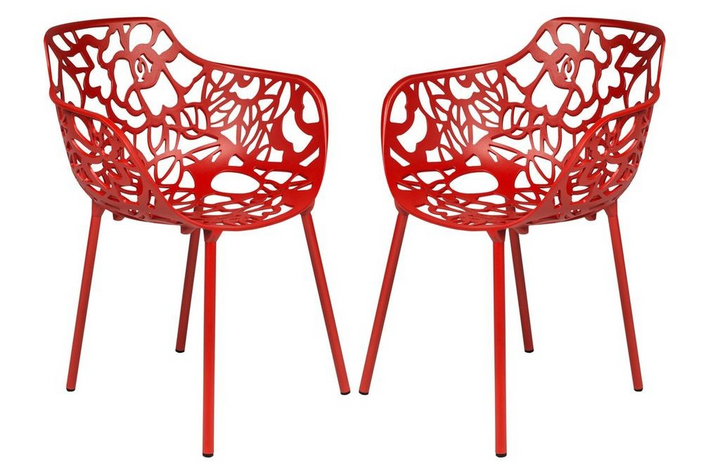 Two red chairs with a floral lace design on a white background.