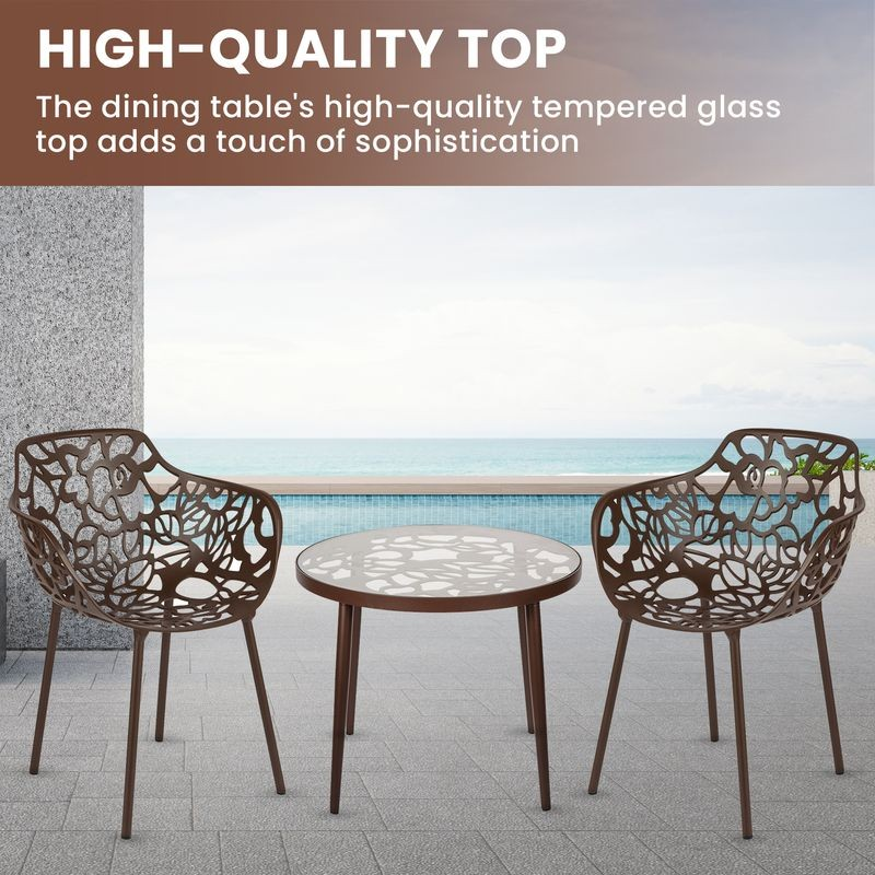 Outdoor dining set with high-quality tempered glass table and chairs by a poolside.