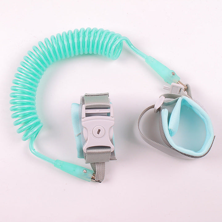 Teal children's leash with gray clip on a white background.