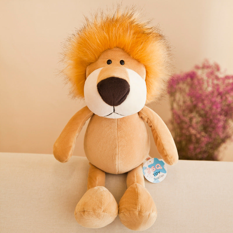 Plush lion toy with a tag on a beige surface and blurred floral background.