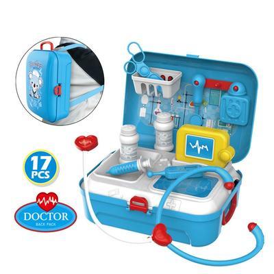 Toy doctor's kit with various medical tools and a blue case on a white background.