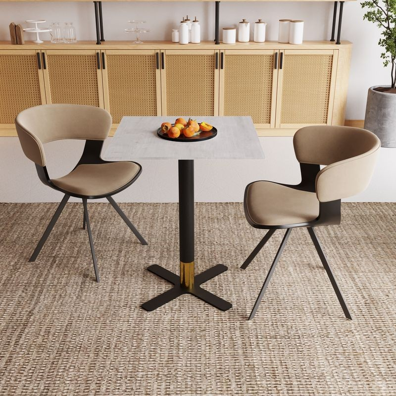 LeisureMod Vail Collection Dining Table Black/Gold X Base With 24" Square Light Wood Brown MDF Top in Room.