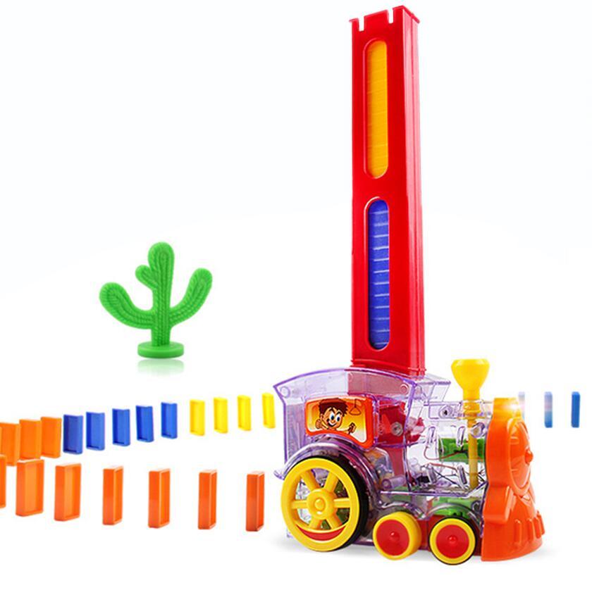 Toy train set with colorful track pieces on a white background.
