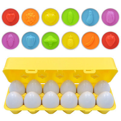 Yellow egg carton with white eggs and colorful fruit-shaped stamps above it.