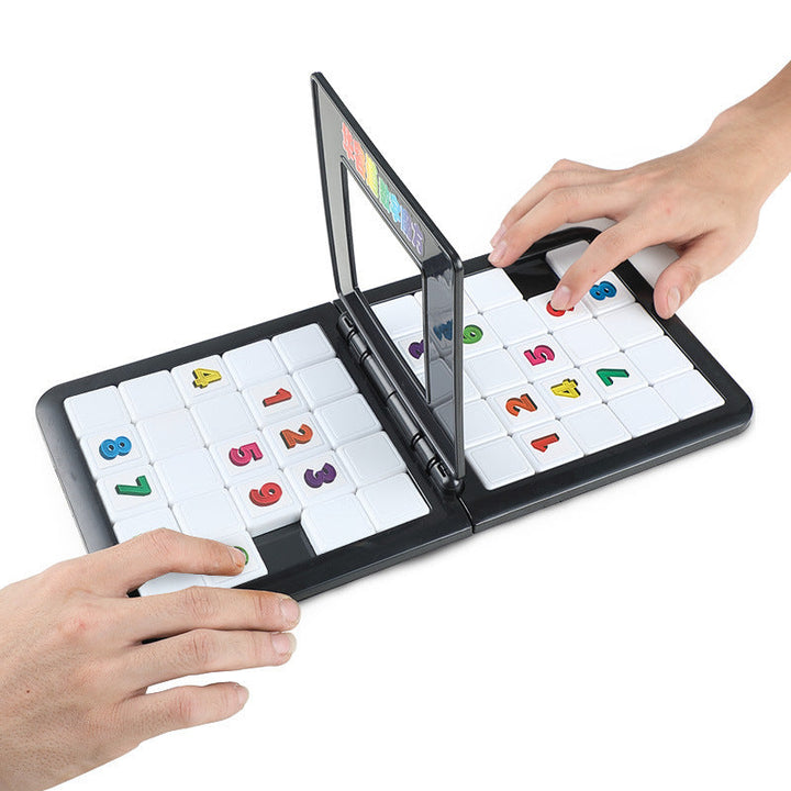 Foldable educational tool with letter and number tiles on a white background.