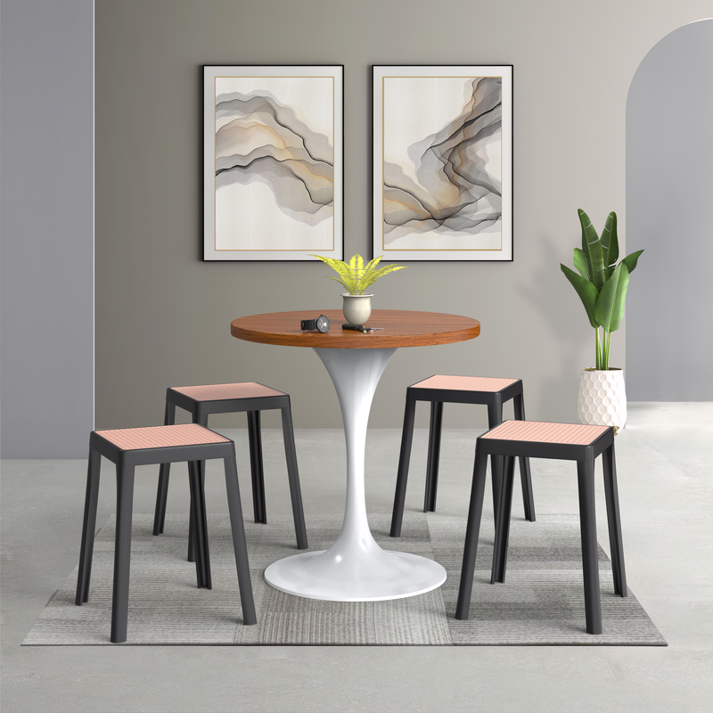 LeisureMod Tresse Series Stackable Poly Stool with Wicker Top in Black at Table.