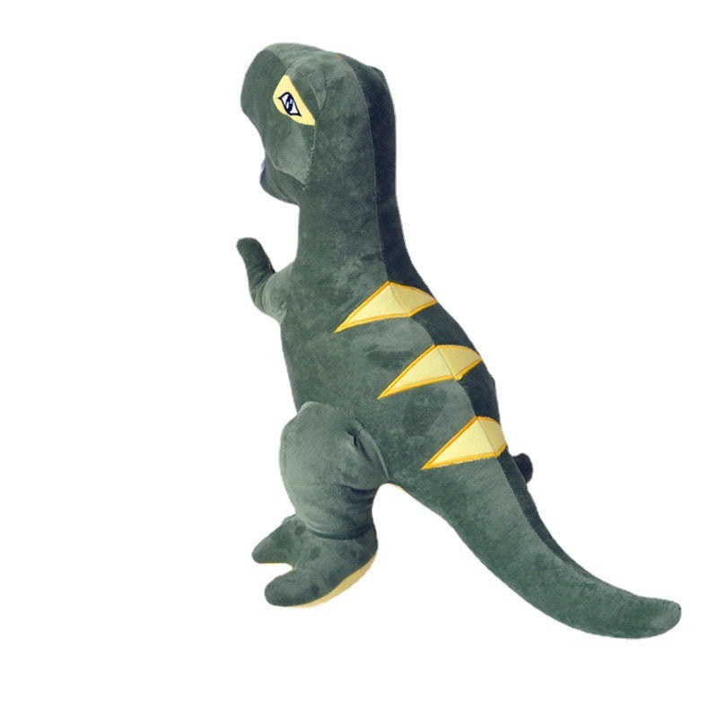 Green dinosaur plush toy with yellow accents on a white background.