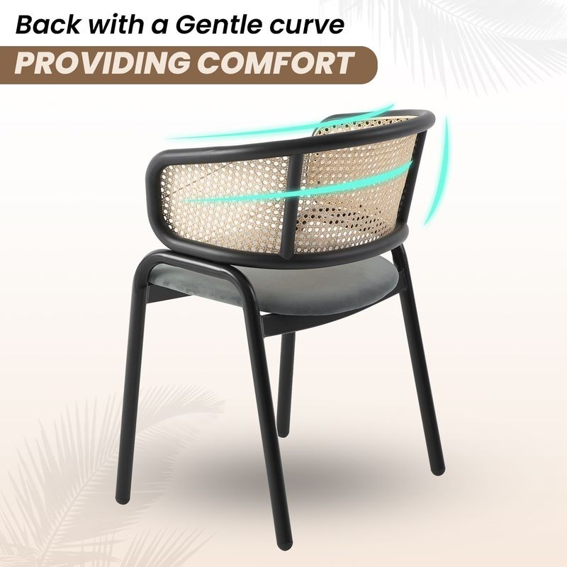Chair with wicker backrest and black frame on a light background.