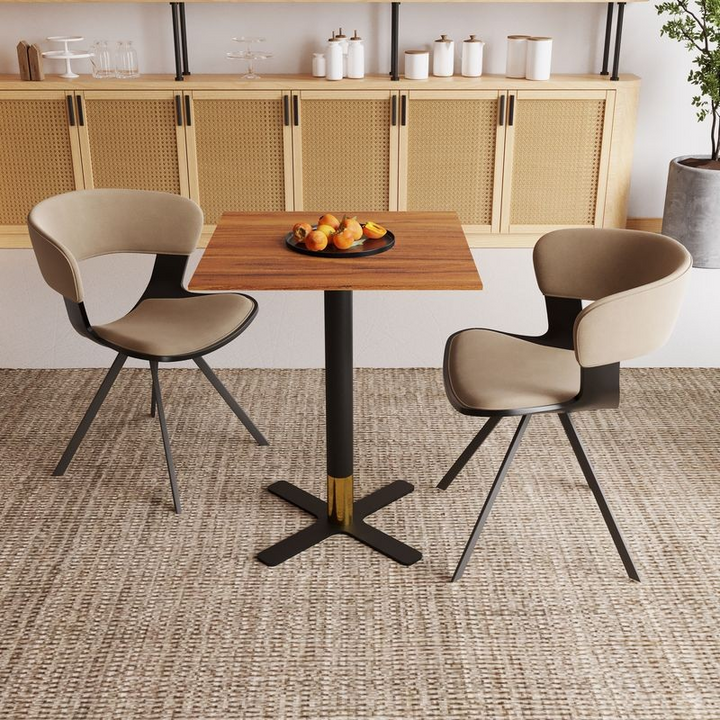 LeisureMod Vail Collection Dining Table Black/Gold X Base With 24" Square Cognac Brown MDF Top in Room.