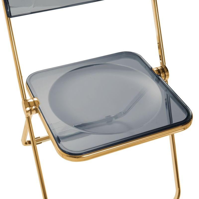 LeisureMod Lawrence Acrylic Folding Chair with Gold Metal Frame Transparent Black Closeup.