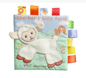 Children's soft book with a lamb illustration on a white background.