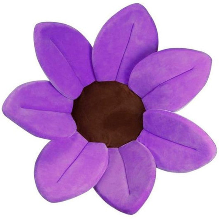Purple flower shaped object with a brown center on a white background.