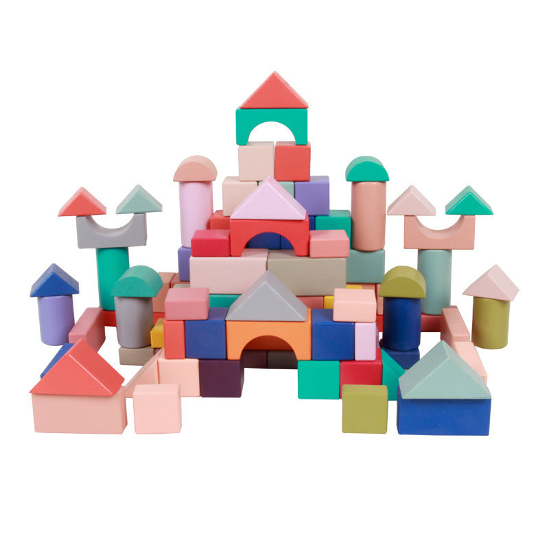 Colorful wooden building blocks on a white background.