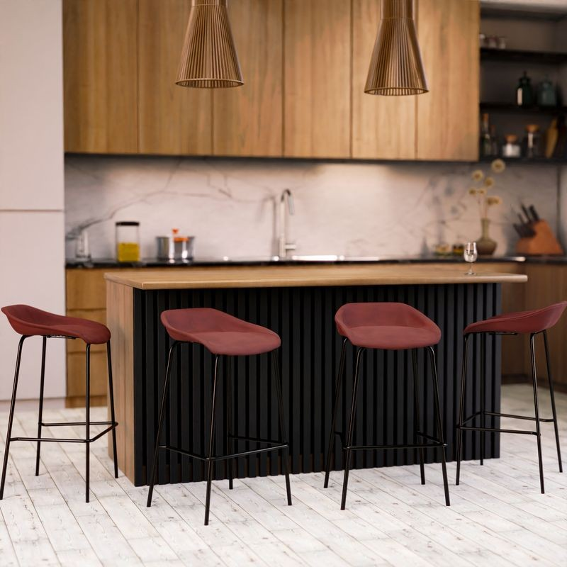 LeisureMod Servos Modern Barstool with Upholstered Faux Leather Seat and Powder Coated Iron Frame in Bordeaux at Table.
