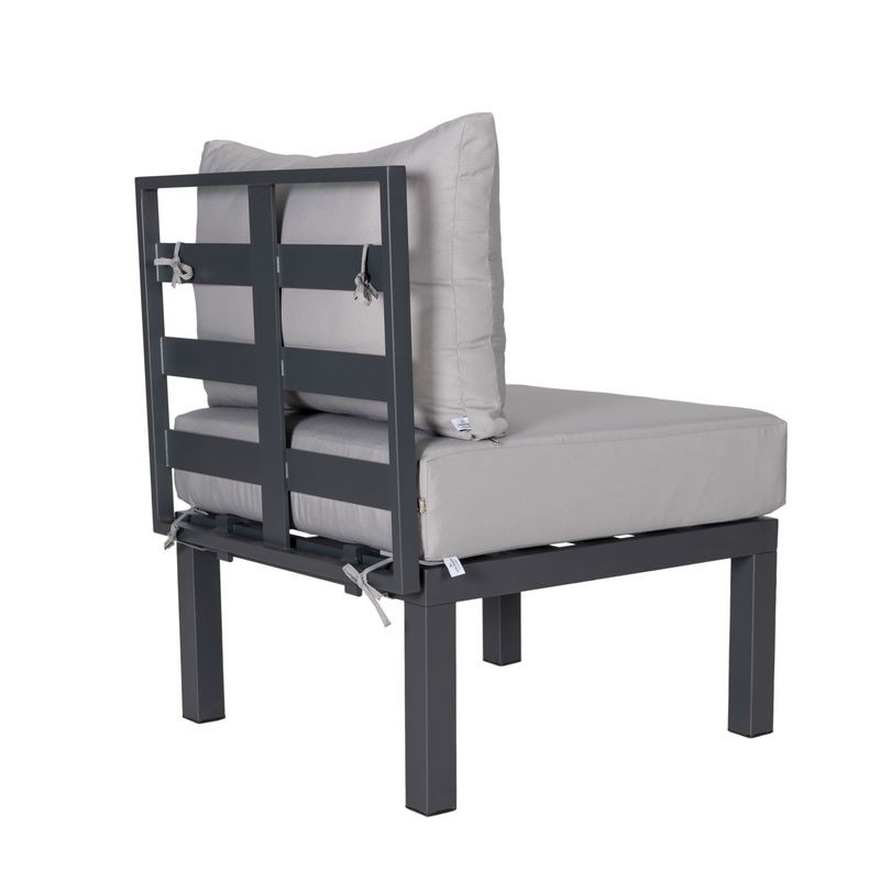 LeisureMod Chelsea 7-Piece Patio Sectional and Coffee Table Set Black Aluminum with Cushions Light Grey Back of Chair.