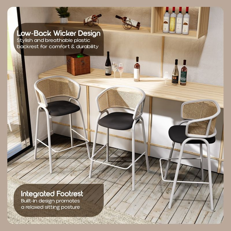 LeisureMod Ervilla Wicker Bar Stool with Fabric Seat and White Steel Frame in Black leather at Bar.