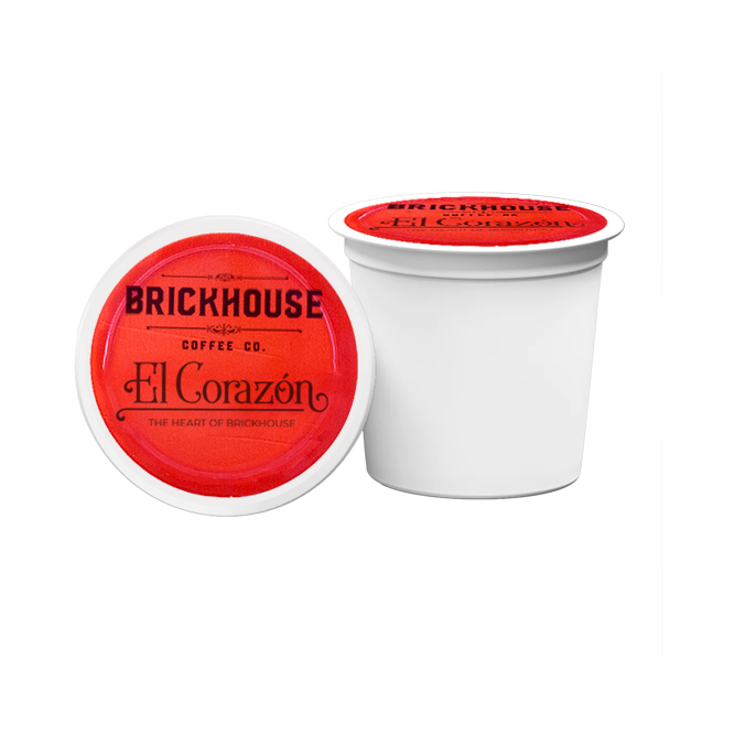 Two Brickhouse Coffee Co. El Corazon coffee pods on a white background