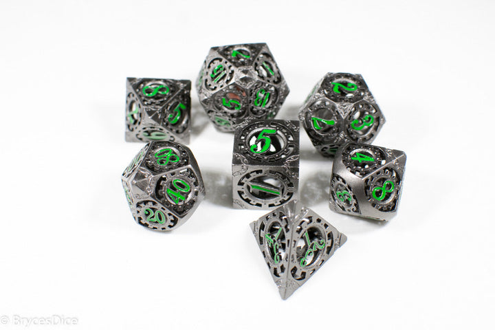 Gun Metal Hollow Gear Dice with Green Numbers 7-Dice Set