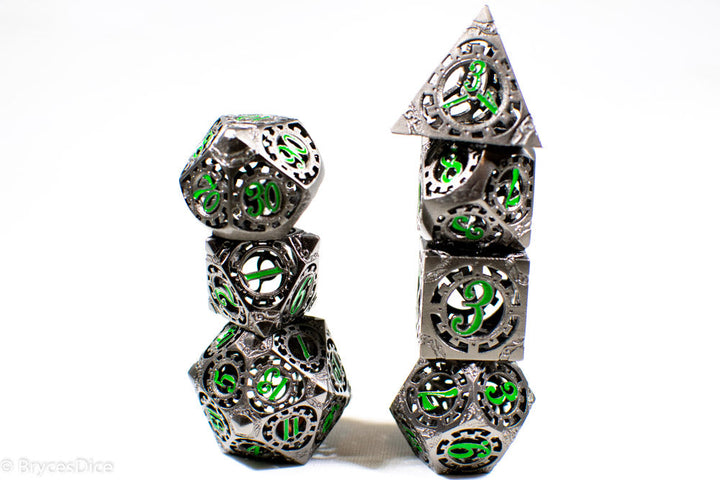 Gun Metal Hollow Gear Dice with Green Numbers 7-Dice Set