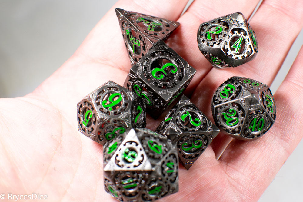 Gun Metal Hollow Gear Dice with Green Numbers 7-Dice Set