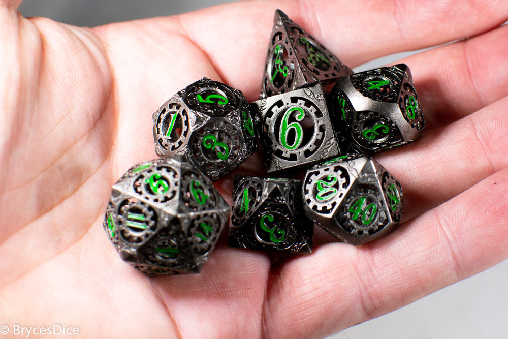 Gun Metal Hollow Gear Dice with Green Numbers 7-Dice Set