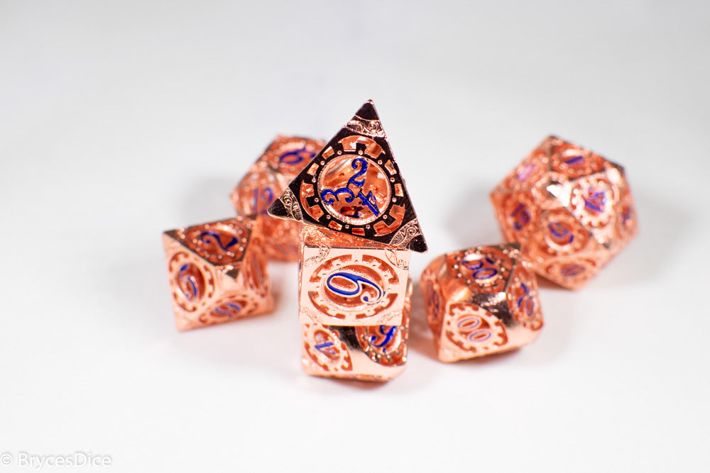 Rose Gold Metal Hollow Gear Dice with Blue Numbers 7-Dice Set