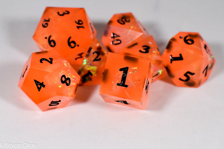 Orangetober Sharp Edge Resin 7-Dice Dice (Orange w/ Black Numbers)