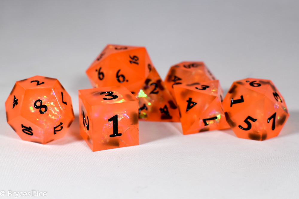 Orangetober Sharp Edge Resin 7-Dice Dice (Orange w/ Black Numbers)