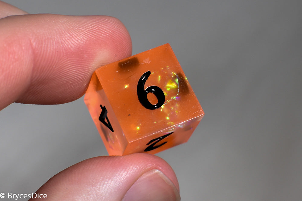 Orangetober Sharp Edge Resin 7-Dice Dice (Orange w/ Black Numbers)