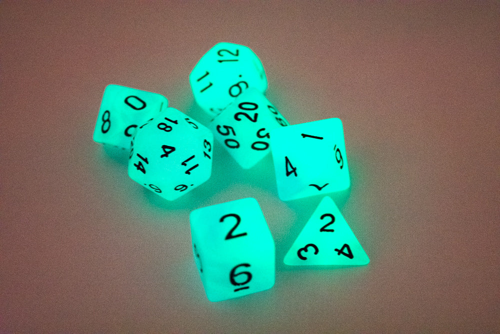 Blue and Purple Glow-in-the-Dark 7-Die Set w/Black Numbers by HDdice