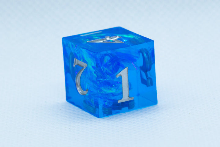 Powder Blue Sharp Edge Resin d6-Dice (Blue w/Silver Numbers) [subtle imperfection]