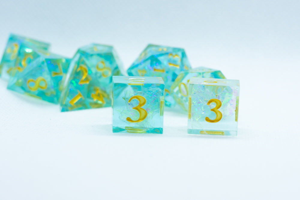Sea-Foam Sharp Edge Resin 7-Dice Dice (Soft Blue w/ Gold Numbers)