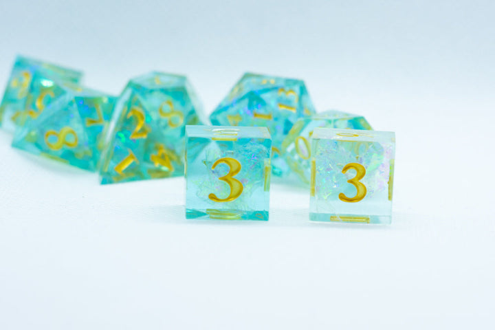 Sea-Foam Sharp Edge Resin 7-Dice Dice (Soft Blue w/ Gold Numbers)