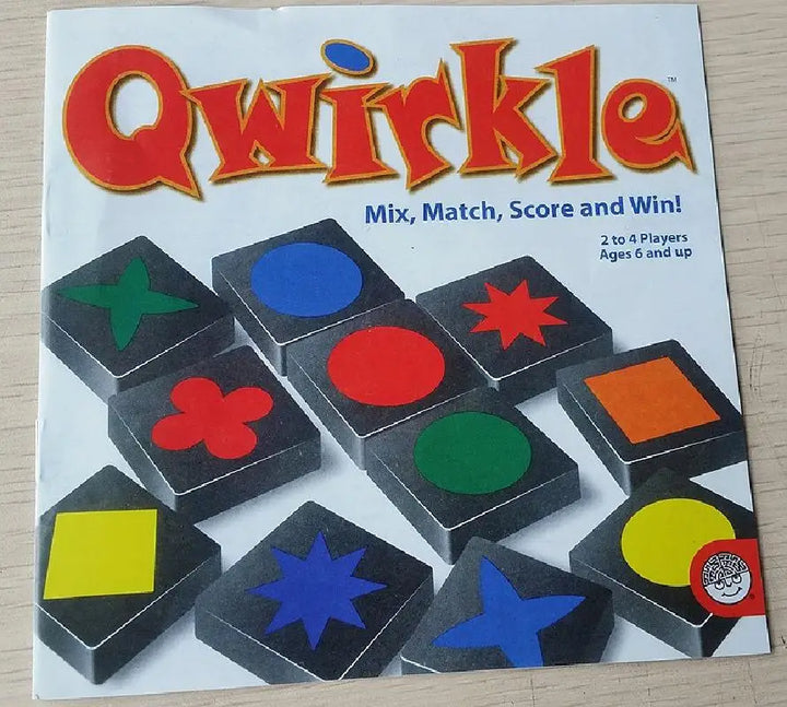 Qwirkle game box with colorful tiles on a white background.