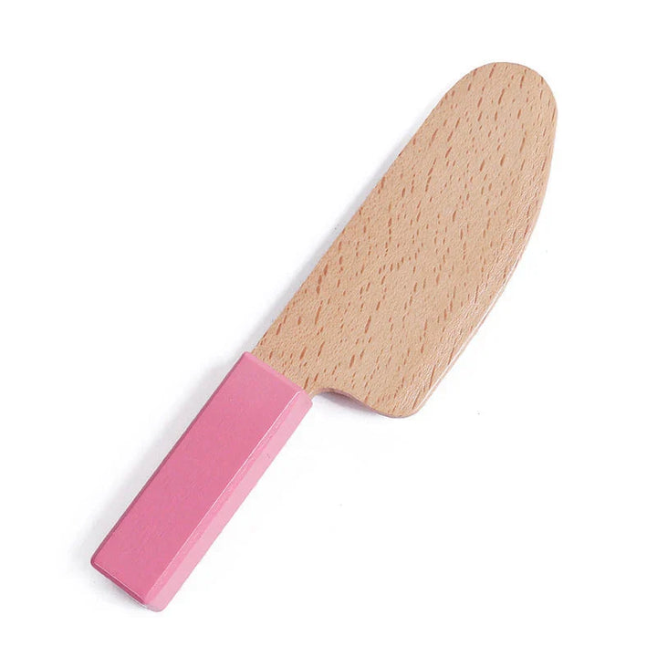 Wooden paddle with pink handle on a white background.