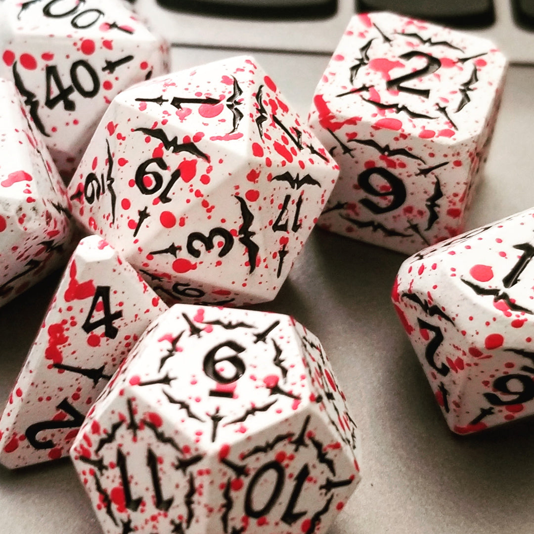 Battle Hardened Dice: White metal dice w/Black numbering and Red Splatter 7- Dice Set Rpg