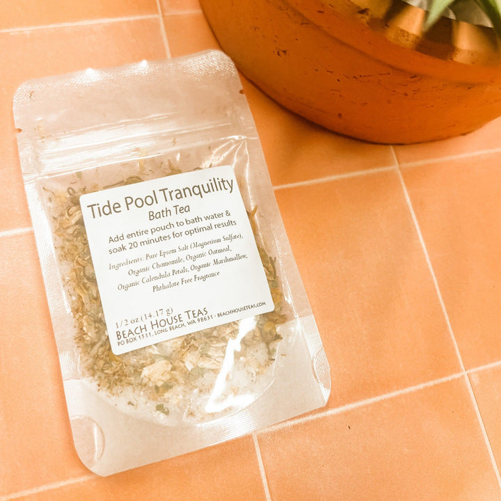 Packaged Tide Pool Tranquility Bath Tea on a tiled surface.
