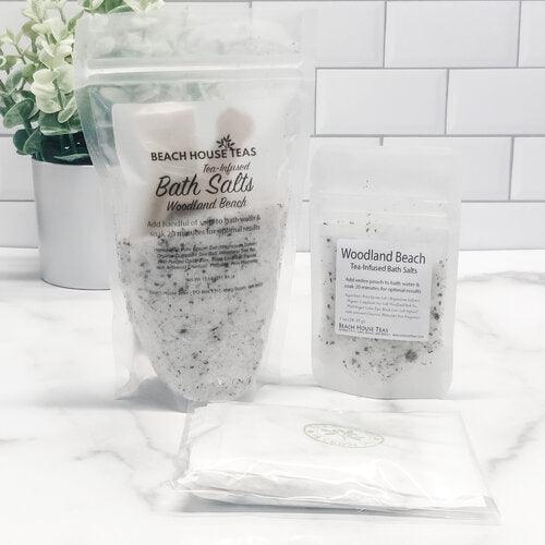 Packaged bath salts with Beach House Teas branding on a white surface.