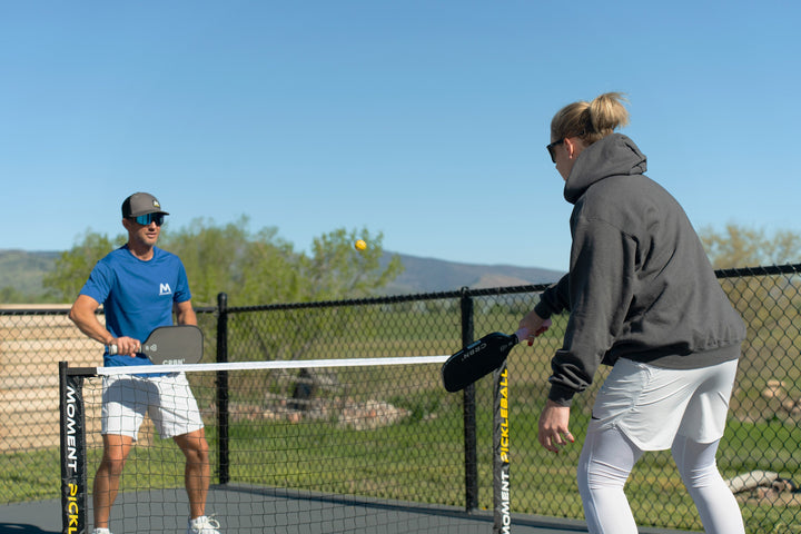 Moment Pickle blasters 2-Color Mini Plastic Indoor/Outdoor Practice Balls for Pickleball Training in Action.