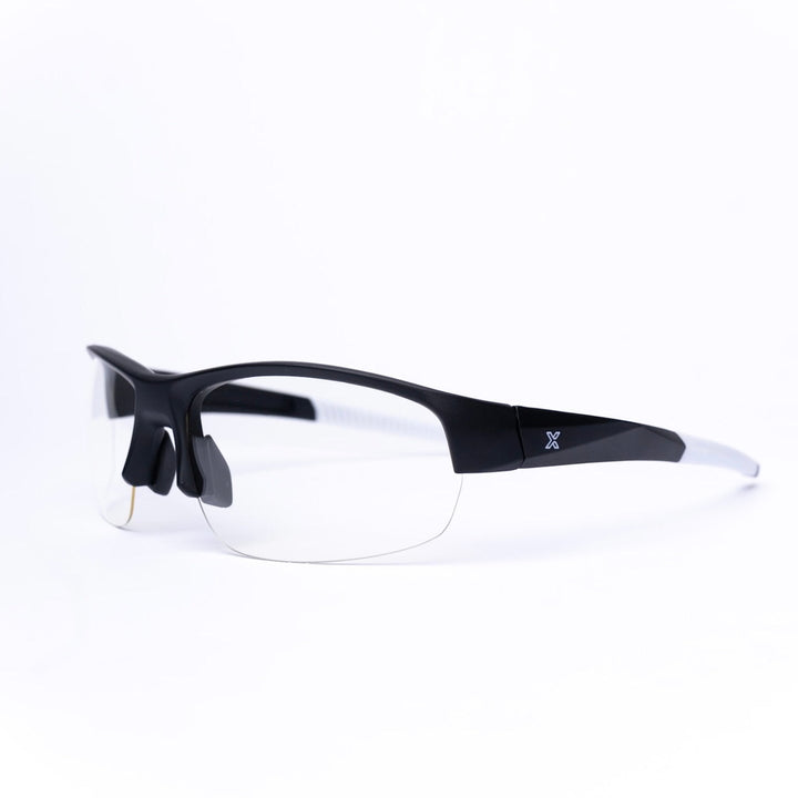 Black safety glasses with clear lenses on a white background.